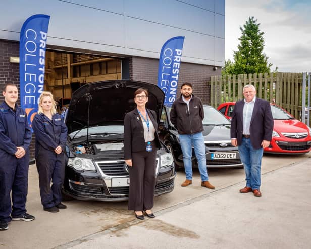 Pictured with workshop vehicles are: (from left) Automotive Technicians Phil Shea and Lianne Brooks, College Principal Louise Doswell, and from Recycling Lives Managing Director of the Cars Division Tazamul Sarodia and Chief Executive Officer Gerry Marshall.