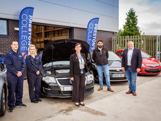 Pictured with workshop vehicles are: (from left) Automotive Technicians Phil Shea and Lianne Brooks, College Principal Louise Doswell, and from Recycling Lives Managing Director of the Cars Division Tazamul Sarodia and Chief Executive Officer Gerry Marshall.