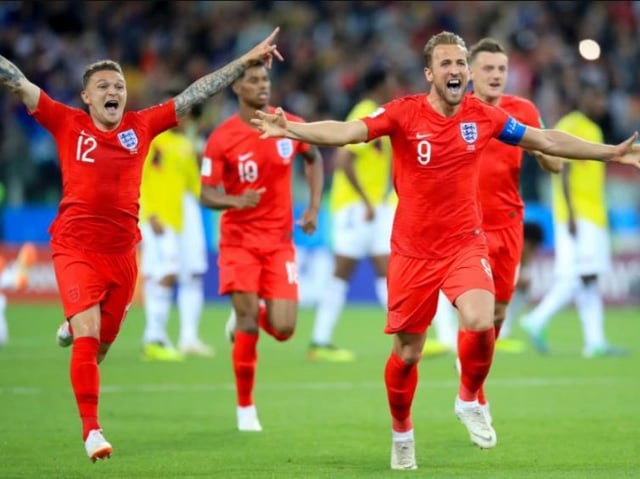 England players celebrate winning their last penalty shoot-out against Colombia in the 2018 World Cup.