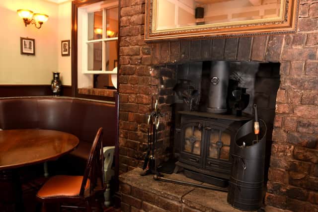 A cosy fireplace at Traders Taphouse in Chorley