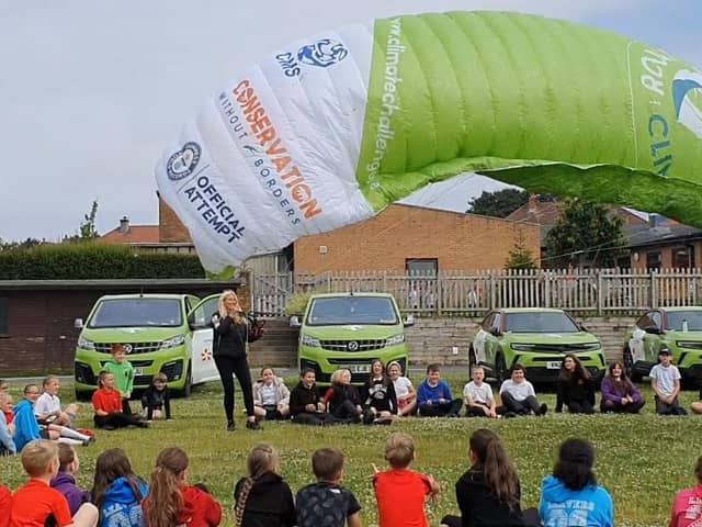 Human Swan Sacha Dent at Trumacar school meeting pupils. Sacha is attempting to be the first to circumnavigate the mainland of Britain using an electric paramotor. Picture by Peter Storry.