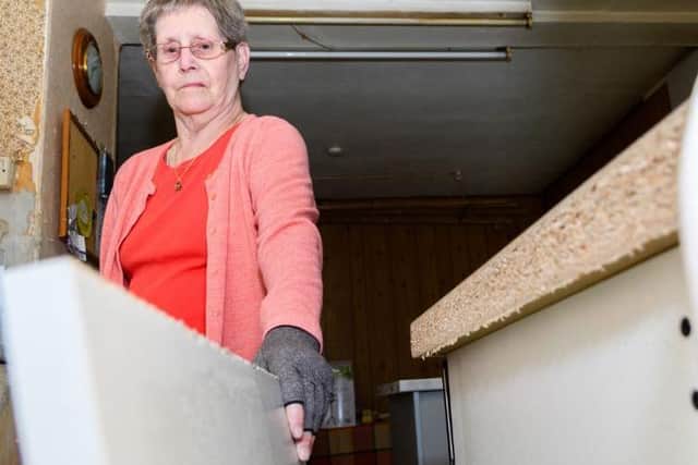 Phyllis was having sleepless nights after her kitchen was left with dodgy electrics and missing tiles