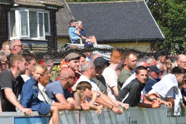 Fans watch the Bamber Bridge v Preston North End game in July 2019
