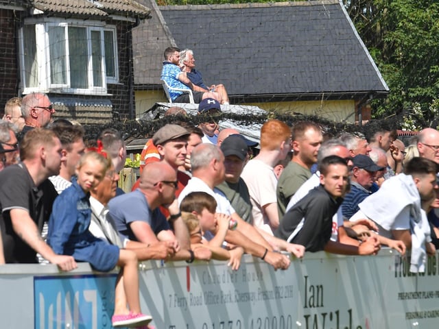 Fans watch the Bamber Bridge v Preston North End game in July 2019