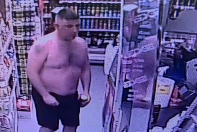 Do you recognise this man? Police want to speak to him after a shopkeeper was assaulted in Nelson. (Credit: Lancashire Police)