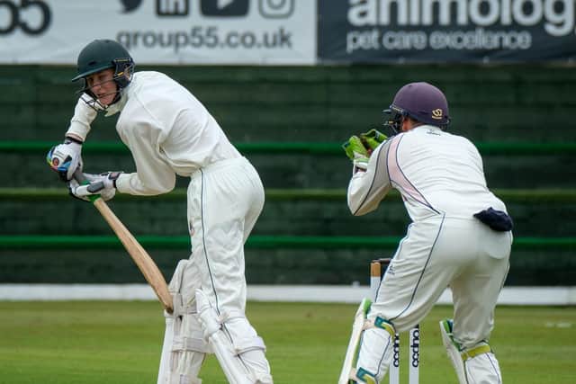 Fulwood and Broughton's Ewan Mansford is caught behind by Blackpool wicketkeeper Ben Howarth