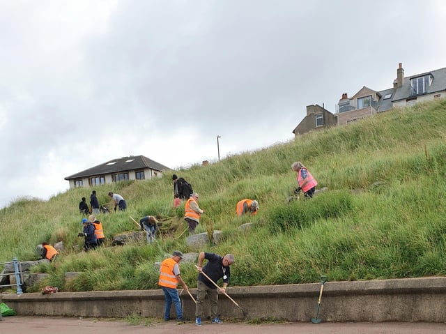 Volunteers from local community groups turned up to do weeding at Sunny Slopes in Heysham, said Lancaster City Council.