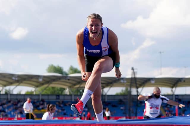 Holly Bradshaw celebrates after setting a new British record in the Women's pole vault final during day two of the Muller British Athletics Championships at Manchester Regional Arena