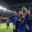 Italy celebrate their shootout victory over Spain and a return to Wembley for Sunday's final