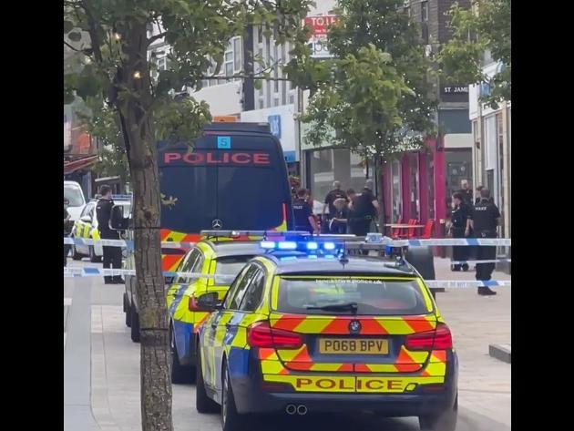 The scene in Burnley town centre this morning where a man was arrested after demanding money and threatening a member of staff in Barclays Bank.