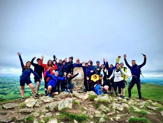 Team NavTrek at the summit of Gowbarrow fell in the Lake District during their 20 mile Ullswater way challenge event that took place on Saturday June 26 2021. From left: Rose Gare-Simmons, Owen Mcalister, Rachel Sear, Scott Mcalister, Mick Wilcox, Danny McManus, Holly Bailey, Jack Mcalister, Lee Fawcett, Stu Ridley, Chris Kelly, Louise Walsh, James Pinkney, Rhian Perry, Janine Taylor-Schonhut, Bryany Benson, Jenna Brown, Andy Brown and James Donoghue.