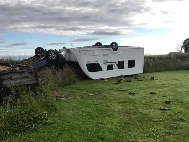 This stolen caravan was found overturned on the A628 in Ashton-under-Lyne, Greater Manchester, after a thief crashed whilst towing it away on Sunday, July 4