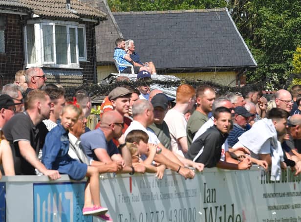 Supporters watch Bamber Bridge's friendly with Preston North End in July 2019