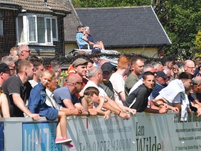 Supporters watch Bamber Bridge's friendly with Preston North End in July 2019
