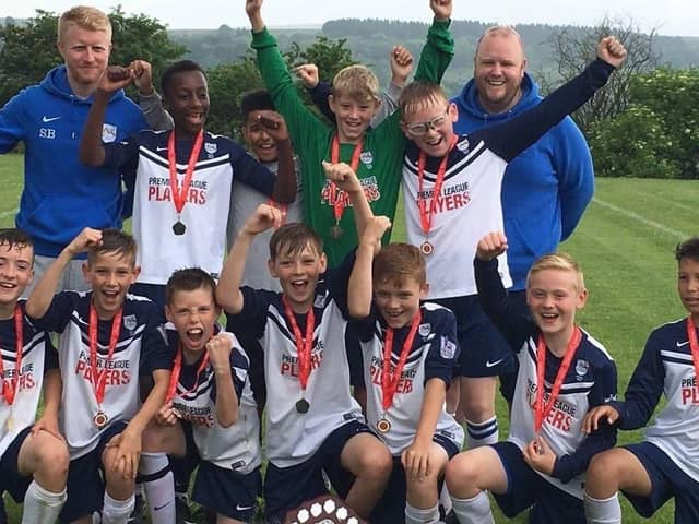 Preston Schools' FA chairman Paul Whelan (back row, far right) with the Preston City Under-11s team in 2016