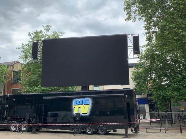The big screen in Preston's Flag Market
