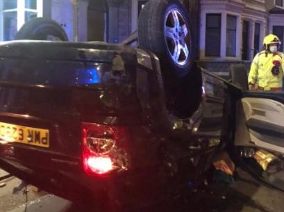 Police, ambulance and fire crews rushed to the scene after the crash outside Touch Wood Boutique in Deepdale Road, Preston at 11.40pm last night (Sunday, July 11). Pic: Deepdale Community Association
