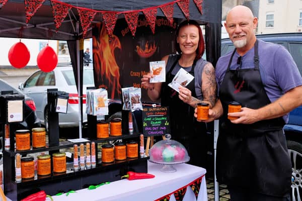 Pete and Emma Yates from Bertie Chippington's Hot Sauce on their stall at the market