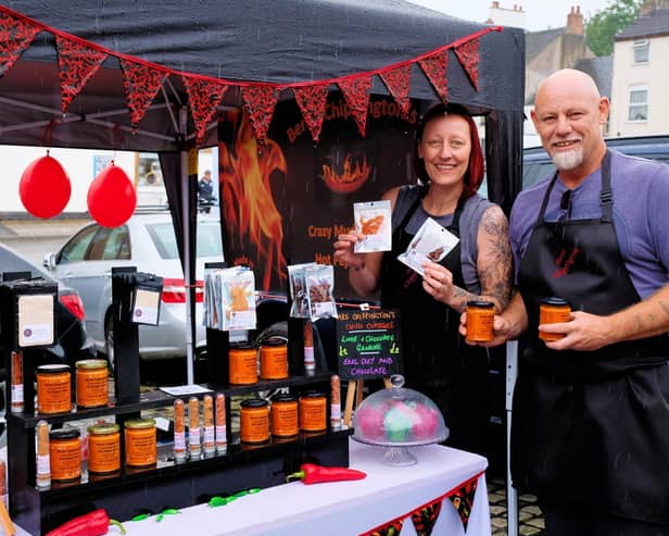Pete and Emma Yates from Bertie Chippington's Hot Sauce on their stall at the market