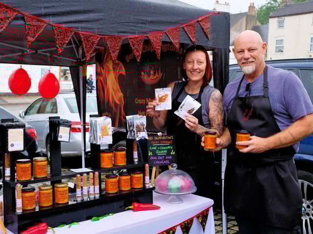 Pete and Emma Yates from Bertie Chippington's Hot Sauce on their stall at the market