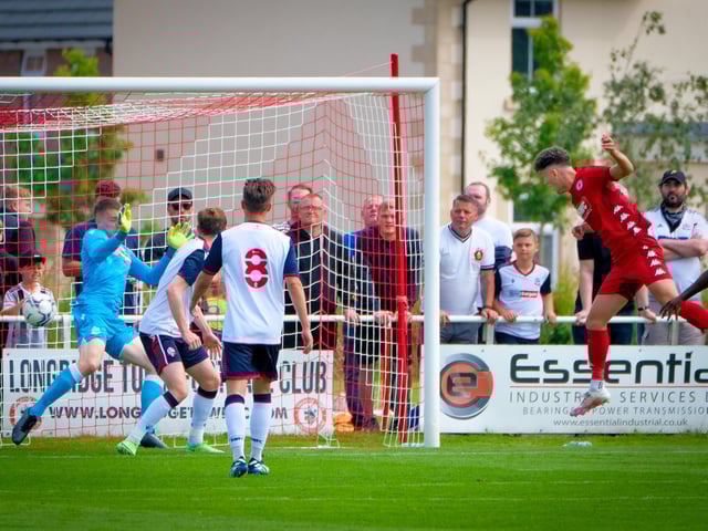Longridge Town take the lead in their anniversary game against Bolton Wanderers