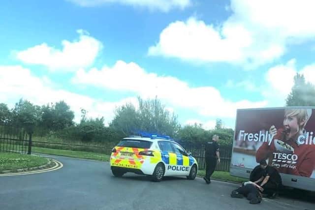 Police make an arrest at the scene in Peel Road, Lytham yesterday (Wednesday, July 14). Pic credit: Jason Eastwood
