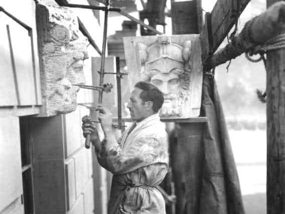 Sculptor at work on Preston Town Hall  in 1932