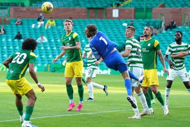 Preston North End goalkeeper Declan Rudd punches the ball away during a Celtic attack