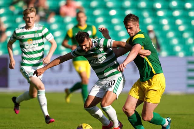 PNE defender Liam Lindsay challenges Celtic's Albian Ajeti