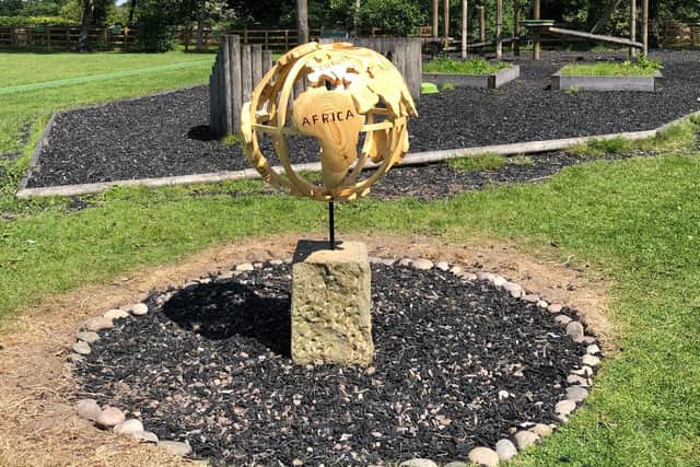 The globe, commissioned by parents and made by John McLaughlin, depicts the world's continents