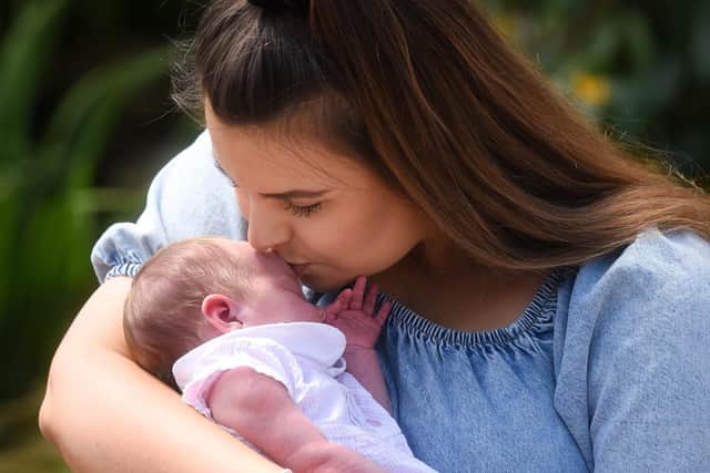 Rhianna Taylor with baby daughter Romi Isabella. Pic: Daniel Martino/JPI Media