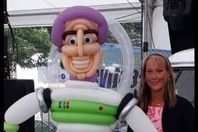 Joanne with  the  Toy Story  Buzz Lightyear character she made from balloons