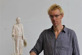 Sculptor Ben Twiston-Davies with the maquette for his statue of Ebenezer Howard, the founder of the Garden City movement, now installed in the centre of Welwyn Garden City