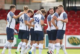 Jamie Thomas (No.34) is congratulated by his PNE team-mates after scoring against Accrington Stanley