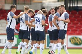 Jamie Thomas (No.34) is congratulated by his PNE team-mates after scoring against Accrington Stanley