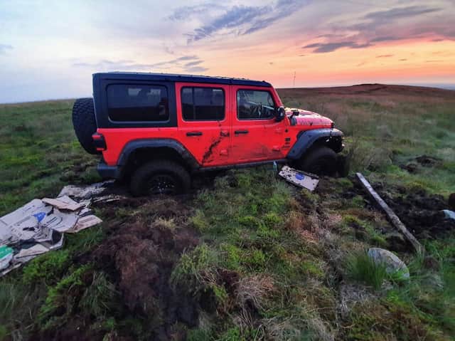 Bolton Mountain Rescue and Lancashire Police were called to Rivington Moor near Chorley at 7.45pm on Saturday (July 24) after two 4x4s - a grey Ford Ranger and a red Jeep Wrangler - got stuck on the protected peatland. Pic: Bolton Mountain Rescue