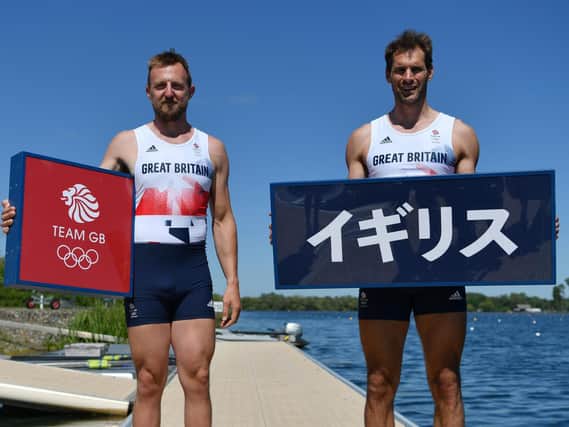 Graeme Thomas, right, and his partner John Collins in Tokyo