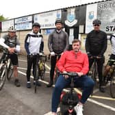 George Melling pictured outside Bamber Bridge's ground with friends who did a charity bike ride to raise funds for research into Motor Neurone Disease