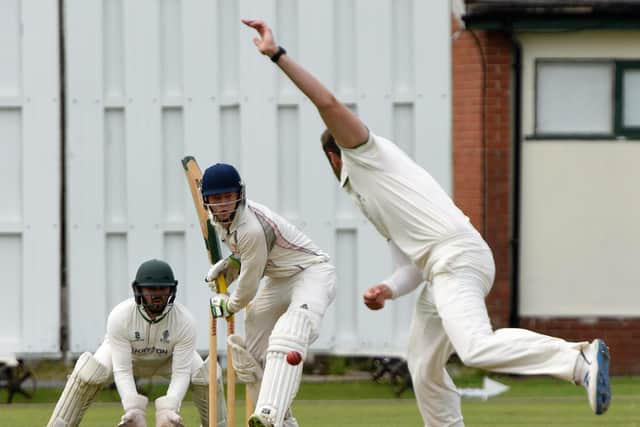 Blackpool batsman Josh Boyne faces a delivery off Leyland's Karl Cross