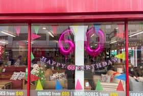 The BHF store in Preston celebrates the charity's 60th birthday with an eye catching window display