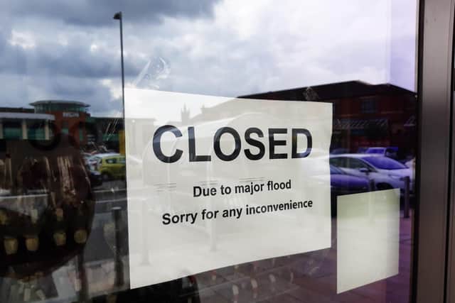 Multiple businesses in Market Walk were forced to close due to flooding on Tuesday, July 27.