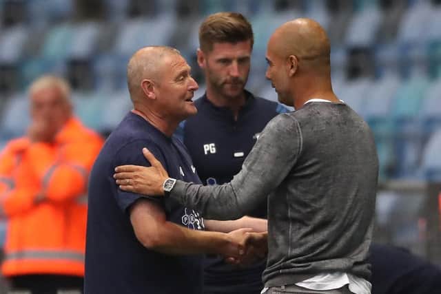 Frankie McAvoy, Paul Gallagher and Pep Guardiola ahead of Preston North End's friendly with Manchester City
