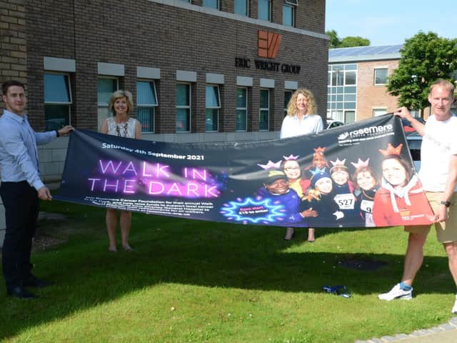 Paving the way for the successful return of Walk in the Dark are, from
the left, Eric Wright Group’s Scott Latta, Linda Morgan and Victoria
Calderbank with Rosemere Cancer Foundation chief officer Dan Hill