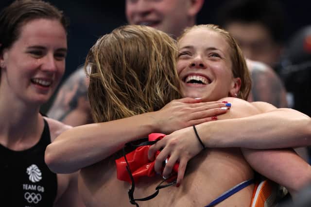 Anna Hopkin (right) celebrates winning the gold medal in the Mixed 4 x 100m Medley Relay Final (Getty Images)