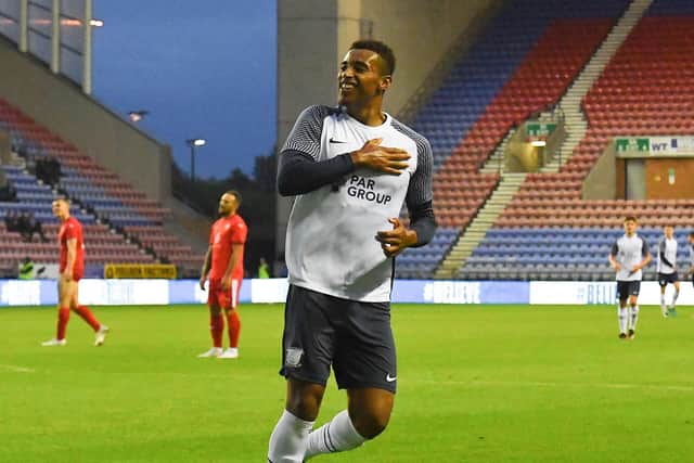 Joe Rodwell-Grant celebrates scoring North End's second goal at Wigan