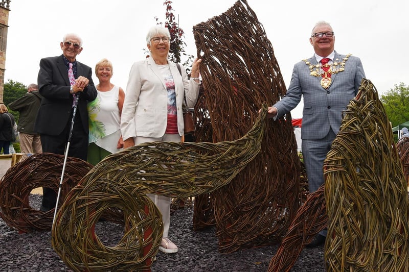 from left, Tom and Jane Atherton from Homescapes, Margaret Lewis a descendant of Myles Standish and The Mayor of Chorley Coun Steve Holgate unveil the willow sculpture of the Mayflower Ship and ocean, by artist Cherry Chung.