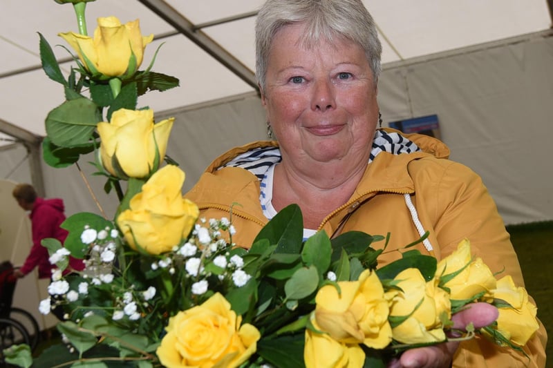 Karen Wilson with her floral display in the competition tent.