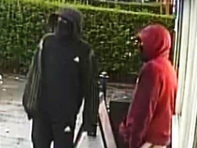 Police want to speak to these men in relation to a robbery at the One Stop store in Ribbleton Avenue. (Credit: Lancashire Police)