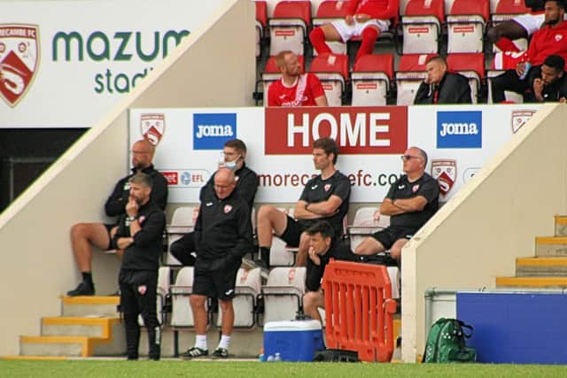 Stephen Robinson (front left) became Morecambe manager in early June