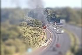 A car burst into flames on the M61 on August 2. (Credit: Highways England)